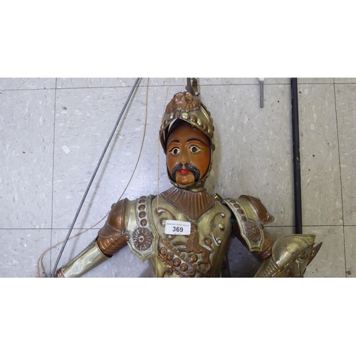 369 - A wooden and metal puppet, fashioned as a knight  38