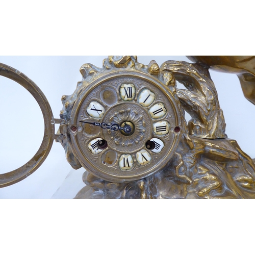 370 - A cast brass mantel clock, fashioned as a rearing horse; the 8 day movement faced by a Roman dial  2... 