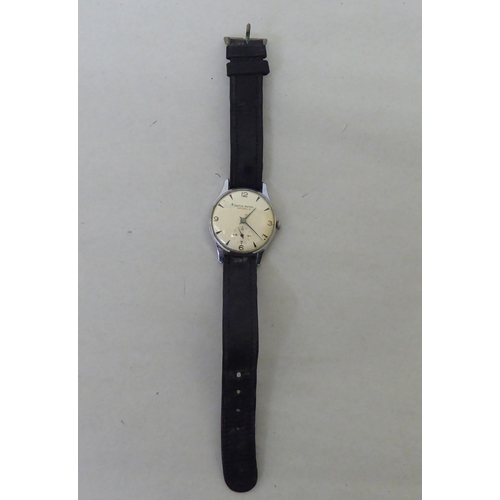 381 - A Smith Atral stainless steel cased manual wristwatch, faced by a baton dial