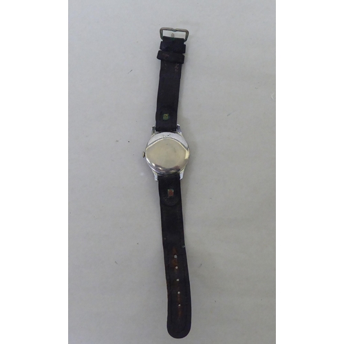 381 - A Smith Atral stainless steel cased manual wristwatch, faced by a baton dial