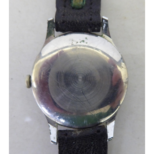 381 - A Smith Atral stainless steel cased manual wristwatch, faced by a baton dial