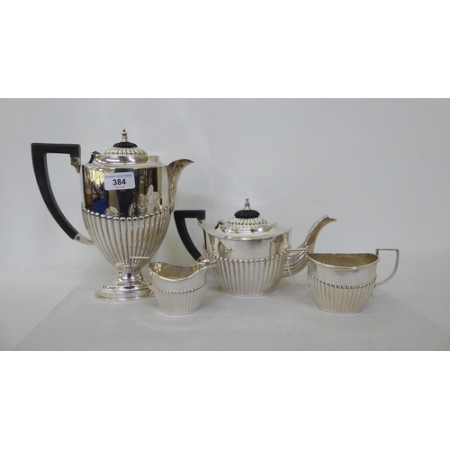 384 - Silver plate: to include a four piece tea set of oval, demi-reeded form