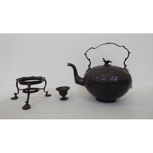 47 - Four items of Arts of Crafts and later metalware: to include a bronze finished teapot on stand