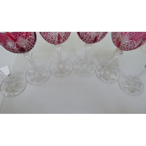 52 - A set of twelve clear and cranberry coloured crystal hock glasses