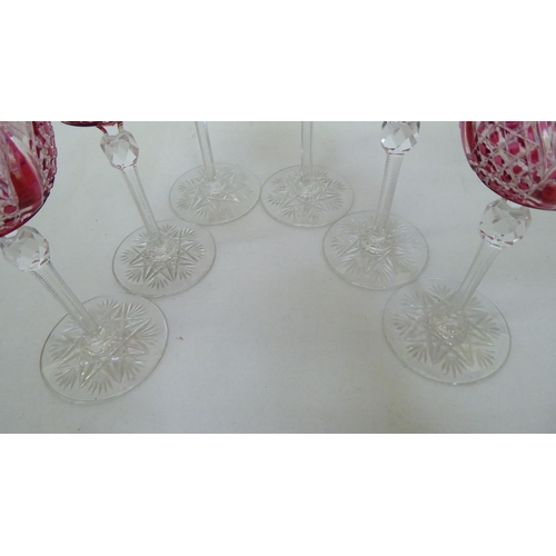 52 - A set of twelve clear and cranberry coloured crystal hock glasses