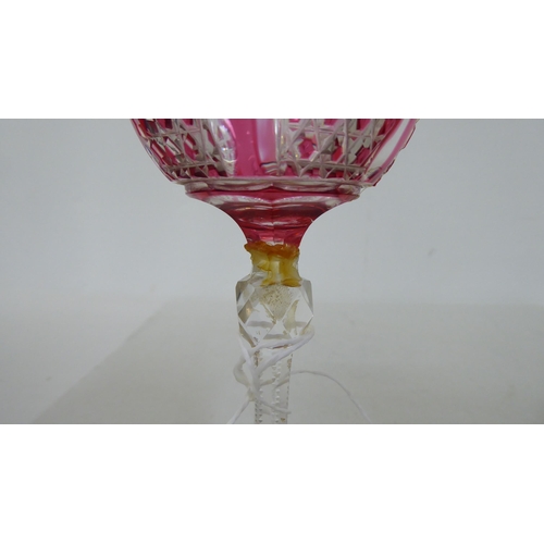 52 - A set of twelve clear and cranberry coloured crystal hock glasses