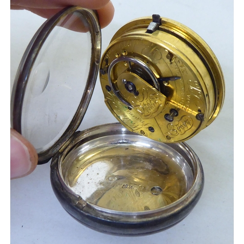 57 - A George IV silver cased pocket watch, the movement faced by an enamelled Roman dial  inscribed West... 