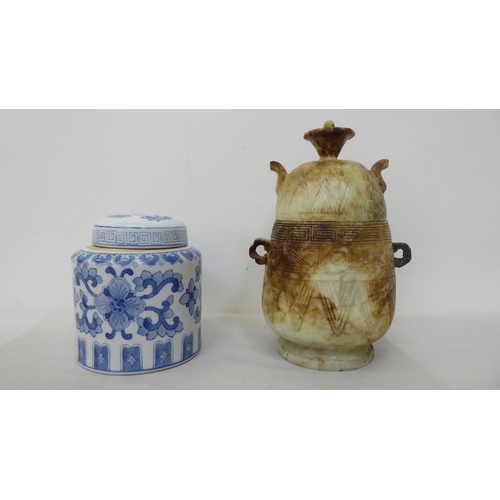 61 - Oriental collectables: to include a porcelain tea caddy, decorated with blue and white flora  7... 