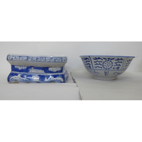 61 - Oriental collectables: to include a porcelain tea caddy, decorated with blue and white flora  7... 