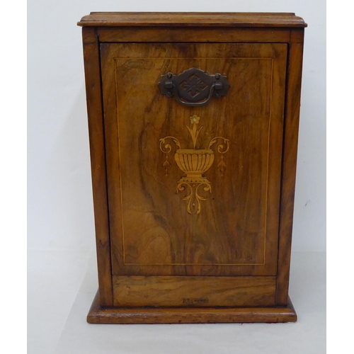 68 - Wooden collectables: to include a late Victorian inlaid, walnut and marquetry desktop stationery cab... 