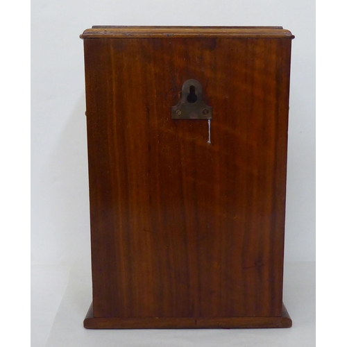 68 - Wooden collectables: to include a late Victorian inlaid, walnut and marquetry desktop stationery cab... 