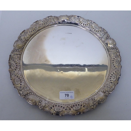 70 - A late Victorian silver tray with a swag embossed, pierced border  Birmingham 1899  12.5