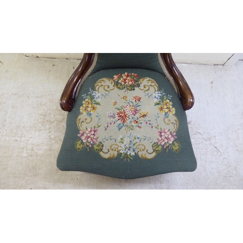 71 - WITHDRAWN A late Victorian walnut framed spoon back salon chair with a tapestry upholstered back and... 