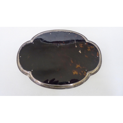 75 - A silver mounted tortoiseshell dressing table tray  Birmingham 1919  10