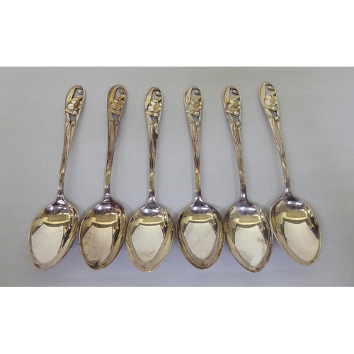 77 - A set of six Art Nouveau silver coloured metal teaspoons, the handles of organic design  stamped Ste... 