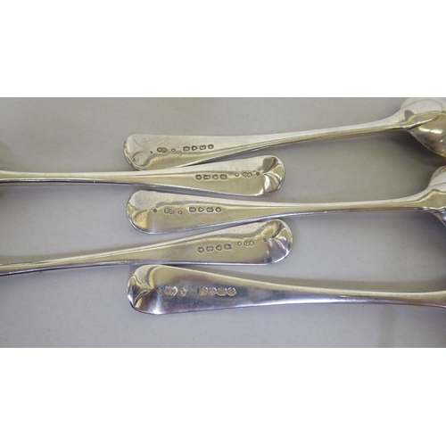 87 - A set of five late Victorian silver Old English pattern dessert spoons  London 1874  (approx. 8ozs)