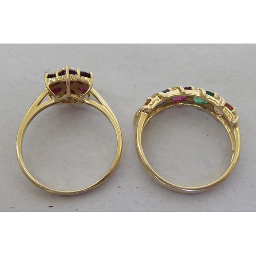 91 - Two 9ct gold rings, set with variously coloured stones