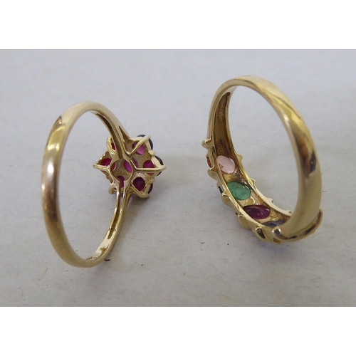 91 - Two 9ct gold rings, set with variously coloured stones