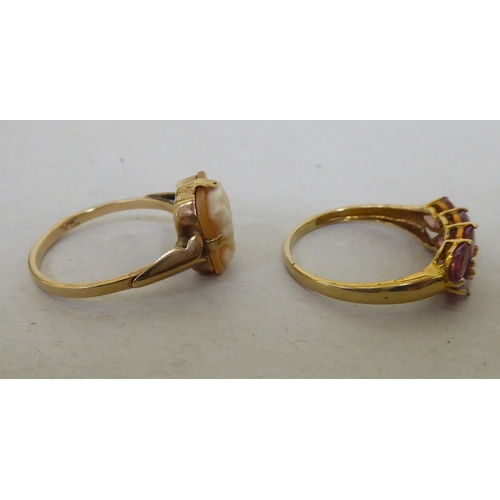 92 - Two 9ct gold rings, set with variously coloured stones