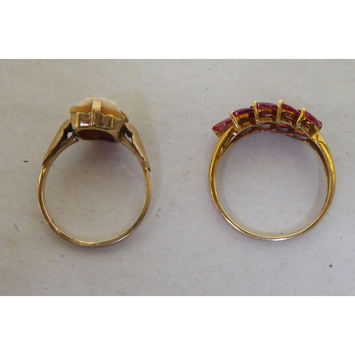 92 - Two 9ct gold rings, set with variously coloured stones