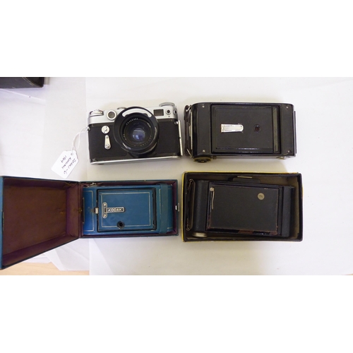 205 - Photographic equipment and accessories: to include a Rolleiflex Synchro Compur camera