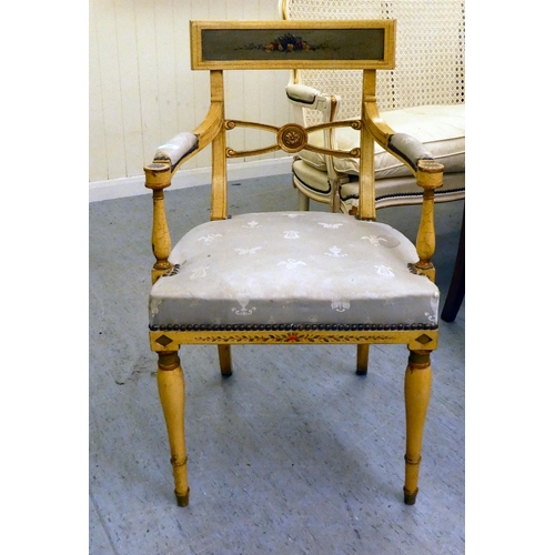 244 - A modern reproduction of a Regency cream painted hall chair, raised on turned, tapered forelegs