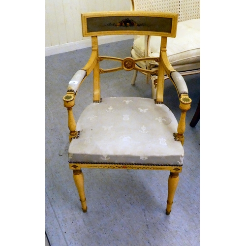 244 - A modern reproduction of a Regency cream painted hall chair, raised on turned, tapered forelegs