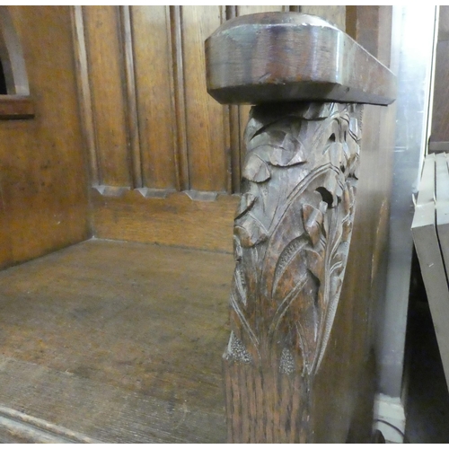 304 - A late Victorian honey coloured oak, Bishop's throne with a high, canopied back with Gothic tracery ... 