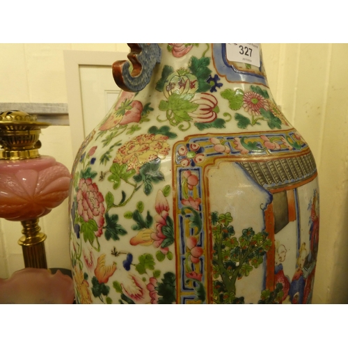 327 - A late 19thC Chinese porcelain vase, decorated with panels of figures, in interior settings  23... 