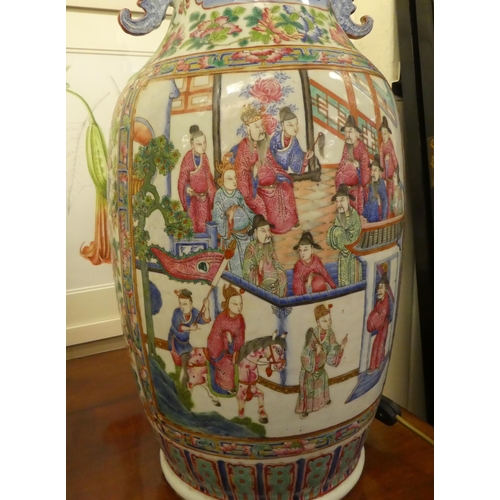 327 - A late 19thC Chinese porcelain vase, decorated with panels of figures, in interior settings  23... 