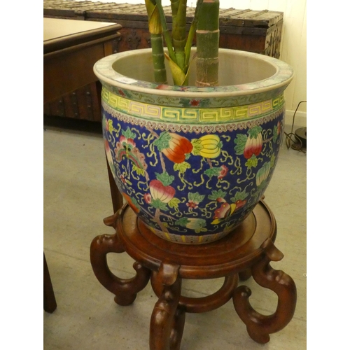 346 - A Japanese style china fish bowl, decorated in bold colours with flora and gilding  15