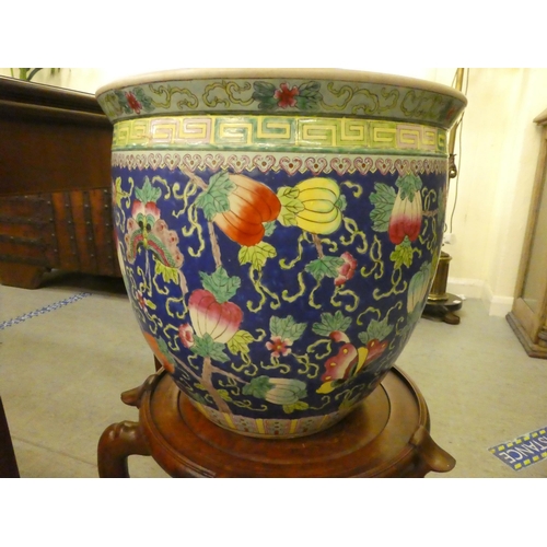 346 - A Japanese style china fish bowl, decorated in bold colours with flora and gilding  15