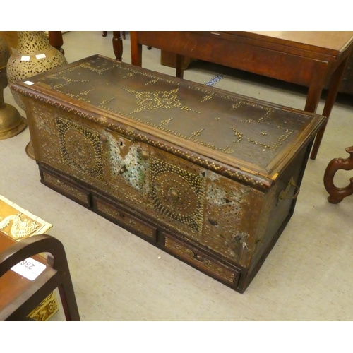 348 - An Asian hardwood chest with profusely applied and rivetted brass ornament with straight sides, a hi... 