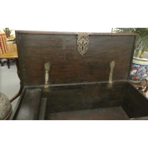 348 - An Asian hardwood chest with profusely applied and rivetted brass ornament with straight sides, a hi... 