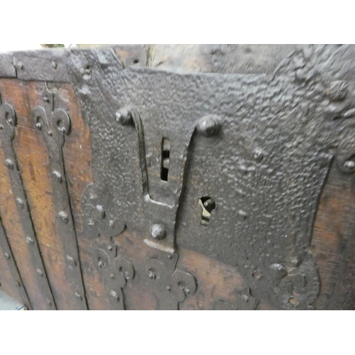 353 - A 17thC low Country oak boarded chest, extensively rivetted iron strapwork, studs and hinges, a clas... 