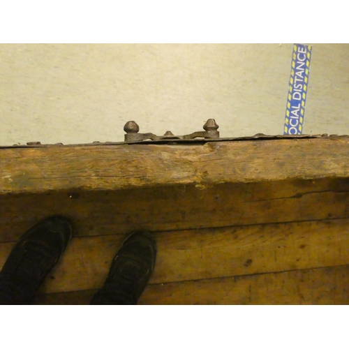 353 - A 17thC low Country oak boarded chest, extensively rivetted iron strapwork, studs and hinges, a clas... 