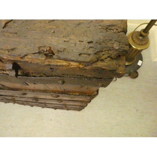 353 - A 17thC low Country oak boarded chest, extensively rivetted iron strapwork, studs and hinges, a clas... 