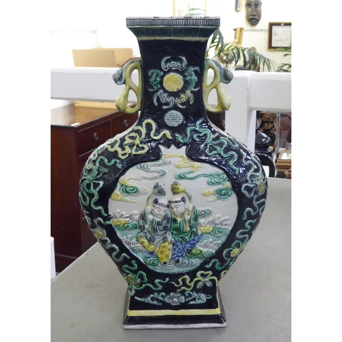 363 - 20thC Oriental and other collectables: to include a circa 1950s Chinese porcelain vase of square, ta... 