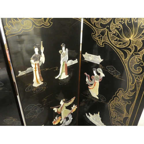 374 - A modern Japanese four-fold black lacquered and gilded roomscreen, decorated to the interior with ap... 