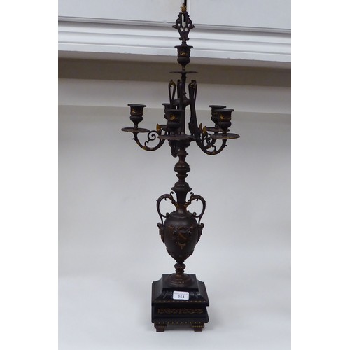 354 - A modern bronze finished metal, five branch candelabra of urn design with a marble plinth  31