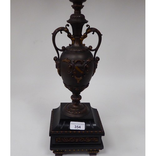 354 - A modern bronze finished metal, five branch candelabra of urn design with a marble plinth  31