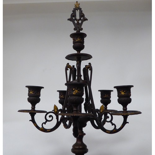 354 - A modern bronze finished metal, five branch candelabra of urn design with a marble plinth  31