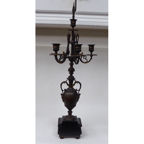 354 - A modern bronze finished metal, five branch candelabra of urn design with a marble plinth  31