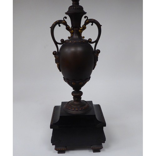 354 - A modern bronze finished metal, five branch candelabra of urn design with a marble plinth  31