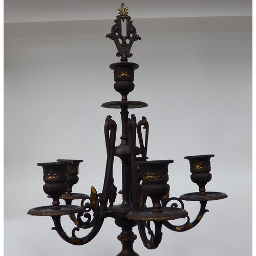 354 - A modern bronze finished metal, five branch candelabra of urn design with a marble plinth  31