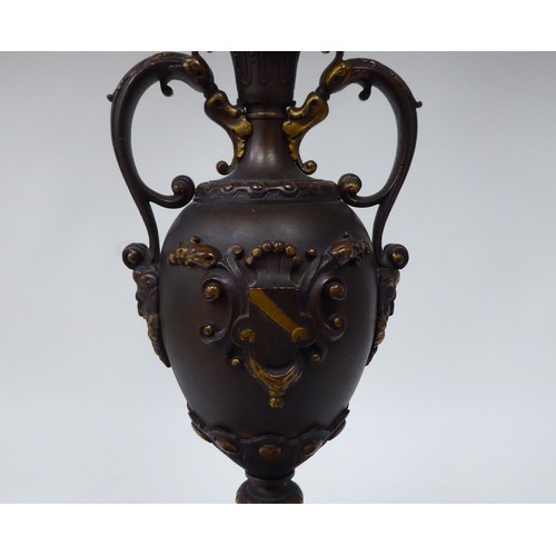 354 - A modern bronze finished metal, five branch candelabra of urn design with a marble plinth  31