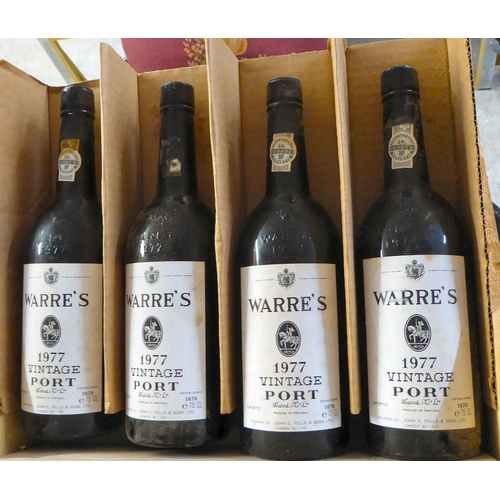 1 - A case of twelve bottles of 1977 Warres Vintage Port, in a card fitted pine crate