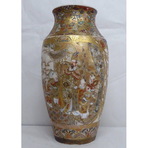 10 - An early 20thC Japanese Satsuma vase, decorated with opposing allegorical cartouches, on a profusely... 