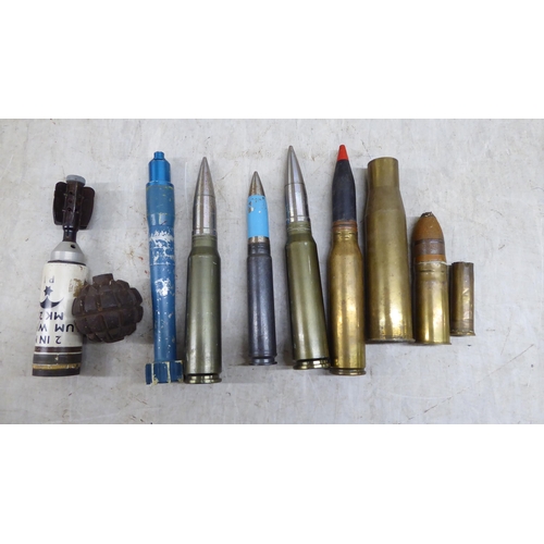 100 - Variously sized empty shell cases  largest 25