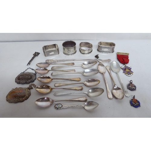 102 - Silver items, mainly spoons and napkin rings  (combined gross weight approx. 8.5ozs)